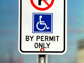 Windsor, Ont (Nov 5/2001) Generic shot of handicap parking sign in front Zellers on Huron Church Rd. Nick Brancaccio photo)