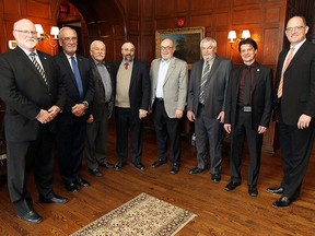 Area mayors John Paterson, left, Ken Antaya, Ron McDermott, Rick Masse, Gary McNamara, Tom Bain, Aldo DiCarlo and Drew Dilkens meet at Willistead Manor in Windsor on Tuesday, March 10, 2015. The meeting represented the first time since the last election all the mayors have met.        (TYLER BROWNBRIDGE/The Windsor Star)
