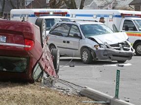 Two vehicles show extensive damage after a collision at Milloy Street and Francois Road on March 30, 2015. (Dax Melmer / The Windsor Star)