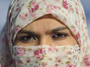 Mississauga's Zunera Ishaq, who wants to be allowed to wear her niqab during the Canadian citizenship ceremony, has sparked a national debate. J.P. Moczulski for National Post