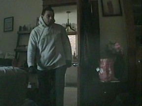 A Windsor thief was caught on camera after breaking into a home in the 1100 block of Elsmere Avenue on Monday, March 9, 2015. (Courtesy of the Windsor police)