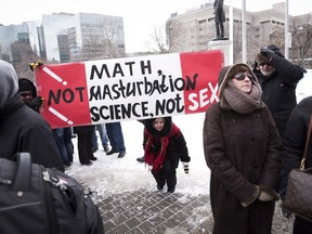 Demonstrators gather in front of Queen's Park to protest against Ontario's new sex education curriculum in Toronto on Tuesday, February 24, 2015. THE CANADIAN PRESS/Darren Calabrese