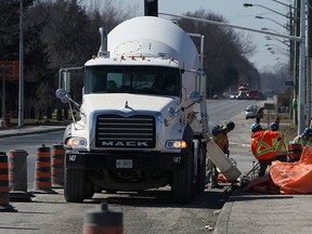 Construction crews continue to work on the parkway project in Windsor on Tuesday, March 24, 2015. The contractor is facing heavy fines after missing the January 1st deadline.              (TYLER BROWNBRIDGE/The Windsor Star)