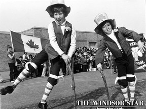 The wearing of the green - With their shillelaghs in hand, Darren Sills, 9 (left) and Buddy Martel, 8, do a jig to celebrate March 17, 1977 in honour of St. Patrick, the patron saint of Ireland. (FILES/The Windsor Star)