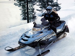 A snowmobile and rider are shown in this 2004 promotional image. (Handout / The Windsor Star)