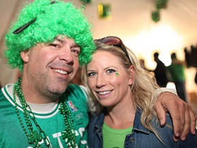 Lonny and Carla Upcott celebrate St. Patrick's Day in a tent at O'Maggio's Kildare House, Tuesday, March 17, 2015.  (DAX MELMER/The Windsor Star)