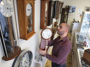 Vraige Fossian, owner of On Time Watch and Jewellery in Windsor, ON. is shown at the Tecumseh Rd. E. business. He says springing forward and falling back is completely useless and confusing and we should just stick with one time.  (DAN JANISSE/ The Windsor Star)