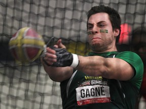Alexandre Gagne from Sherbrooke University competes in the men's weight throw at the 2015 CIS Track and Field Championships at the St. Denis Centre Friday. (DAX MELMER/The Windsor Star)