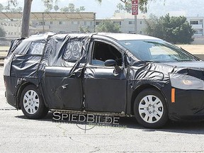 Spy photo of the 2016 Dodge version of the Town & Country minivan. No credit.