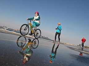 Windsorites enjoy the recent warmer temperatures as they bike and run along Windsor's riverfront, Saturday, March 7, 2015.  (DAX MELMER/The Windsor Star)