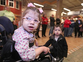 Fatemah Alhassamah, 5, who suffers from cerebral palsy and bilateral vocal chord paralysis, is pictured at the Zehrs Great Food Store at 7201 Tecumseh Rd. East, Saturday, March 7, 2015.  Fatemah was presented with a $20,000 grant from the President's Choice Children's Charity which will provide her family with a new wheel chair accessible van.  (DAX MELMER/The Windsor Star)
