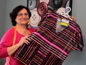 Alba Elliott and a host of volunteers create dignity robes for radiation patients.  (NICK BRANCACCIO/The Windsor Star)
