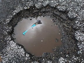 Windsor area potholes put drivers in the hole, April 9, 2015. Wednesday April 9, 2015. (NICK BRANCACCIO/The Windsor Star)