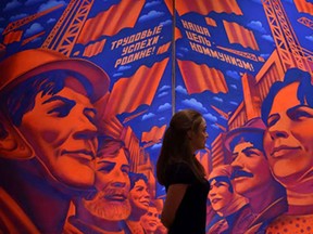 A woman looks at the painting "Implementing the Resolutions of the 26th Party Congress" by Andrei Bondarev at the exhibition "Hyperrealism. When Reality Becomes Illusion at the Tretyakov Gallery on Krymsky Val in central Moscow on April 1, 2015. The exhibition runs from 13 March to 26 July.
IOTD Wednesday
Artists perform in central Saint Petersburg on April 1, 2015 to mark April Fools' Day.
IOTD Wednesday
A memorial of flowers and candles is pictured in front of the Joseph-Koenig-Gymnasium secondary school in Haltern am See, western Germany on April 1, 2015, from where some of the Germanwings plane crash victims came. A church service will take place in the small western German town of Haltern to remember 16 pupils and two teachers from the same school who were killed in the Germanwings air disaster as they returned from an exchange trip to Barcelona.
IOTD Wednesday
PM militarized police commandos patrol the Praia da Ramos and Roquette Pinto communities, part of the Mare Complex shantytown in Rio de Janeiro, Brazil, on April 1, 2015. Rio's police Wednesday began the sheduled plan of replacing the army involved in pacification tasks in the 140,000 inhabitants Mare Complex slum in a process they expect to end by June 30.
IOTD Wednesday
Yemeni supporters of the Shiite Huthi militia attend a demonstration in the second largest city of Taiz on April 1, 2015, to protest against the Saudi-led coalitions Operation Decisive Storm against the Huthi rebels in Yemen.
IOTD Wednesday
A man waits to receive his pension paid in Russian ruble notes in the eastern Ukrainian city of Donetsk on April 1, 2015. The year-long conflict in east Ukraine has closed businesses across the industrial heartland, ramping up unemployment, crippling its financial sector and leaving it ever more reliant on Moscow.
Iron Workers Memorial bridge
Newly installed anti-suicide fences are pictured along the Iron Workers Memorial bridge linking Burnaby and North Vancouver, Tuesday, March 31, 2015. The newly installed fences are meant to prevent suicidal people from jumping from the bridge.
Pope
Pope Francis catches a jersey thrown by a pilgrim during his weekly general audience at St Peter's square on April 1, 2015 at the Vatican.
Balloons
A man installs shark-shaped balloons enclosed in a plastic globe in a water fountain in Nice on April 1, 2015.
Volcano
Mount Sinabung releases pyroclastic flows seen from Tiga Serangkai, North Sumatra, Indonesia, Wednesday, April 1, 2015. Mount Sinabung, among about 130 active volcanoes in Indonesia, has sporadically erupted since 2010 after being dormant for more then 400 years.
Germanwings
In this photo taken on Tuesday, March 31, 2015 and provided by the French Interior Ministry, French emergency rescue services work among debris of the Germanwings passenger jet at the crash site near Seyne-les-Alpes, France. The heads of Lufthansa and its low-cost airline Germanwings are visiting the site of the crash that killed 150 people amid mounting questions about the co-pilot and how much his employers knew about his mental health.
Germanwings
A handout photo taken on March 31, 2015 and released by the French Interior Ministry on April 1, 2015 shows a part of the crash site of the Germanwings Airbus A320 near Le Vernet, French Alps.
Butterfly
A Tiger butterfly sits on the nose of a child during a photocall in the Natural History Museum's 'Sensational Butterflies' outdoor butterfly house in London on March 31, 2015.
WIndy
A woman has her hair fluttering in the wind during stormy weather near the lake Ammersee in the small Bavarian village of Herrsching, southern Germany, on March 31, 2015. Storm front "Niklas" sweeping over the whole country reaches a speed of 140 km/h, according to meteorologists.
Chile
View of smoke billowing from the Villarrica volcano, in Pucon, some 800 km south of Santiago, on March 29, 2015. Part of southern Chile is on orange alert because of an increase in activity at the Villarrica volcano, just weeks after it erupted and forced thousands of people to evacuate.
South Korea
South Korean Marine amphibious assault vehicles fire smoke shells to land on the seashore during a joint landing operation by US and South Korean Marines in the southeastern port of Pohang on March 30, 2015. The drill is part of the annual joint exercise Foal Eagle to enhance the combat readiness of the US and South Korea supporting forces in defense of the Korean Peninsula.
Rhino
A runaway rhinoceros is watched by residents as it travels along a road in Hetauda, Makawanpur district some 40kms south-west of Kathmandu on March 30, 2015. A runaway rhinoceros escaped from a wildlife reserve and ran through a town in central Nepal, terrifying commuters as its rampage left one dead and six injured, police said.A local police official told AFP the rhino escaped from the unfenced Parsa Wildlife Reserve and wandered some 20 kilometres into neighbouring Makwanpur district, shocking onlookers as it ran through the streets, chasing vehicles and people.
Nigeria
A man wears glasses and body paint adorned with the logo of Nigeria's main opposition All Progressives Congress (APC) as residents await results of the presidential election in Abuja, on March 30, 2015. Nigerians awaited the first results of a closely fought general election, despite protests over the conduct of the vote and calls for calm given fears of a repeat of post-poll violence. The presidential election pitting President Goodluck Jonathan against former military ruler Muhammadu Buhari is the closest in Nigeria's history, and first to present a credible opposition challenge.
Chile’s striker Alexis Sanchez
Chile’s striker Alexis Sanchez (L) vies with Brazil’s defender Danilo during the friendly international football match between Brazil and Chile at The Emirates Stadium in London on March 29, 2015.
Seyne villagers and Red Cross
Seyne villagers and Red Cross members pay tribute in front of a stella in memory of the victims of the Germanwings Airbus A320 crash, in the small village of Le Vernet, French Alps, on March 28, 2015, near the site where an Airbus A320 crashed on March 24. The Germanwings co-pilot who flew his Airbus into the French Alps, killing all 150 aboard, hid a serious illness from the airline, prosecutors said on March 27 amid reports he was severely depressed. The stele reads “In memory of the victims of the air disaster of March 24, 2015”.
Australia’s captain Michael Clarke
Australia’s captain Michael Clarke (C) lifts the winning trophy of 2015 Cricket World Cup after beating New Zealand in the final in Melbourne on March 29, 2015.
A masked supporter of Malaysia’s opposition leader Anwar Ibrahim
A masked supporter of Malaysia’s opposition leader Anwar Ibrahim stands in front a police barricade during a protest demanding his release in Kuala Lumpur on March 28, 2015. Malaysian police arrested three leading opposition politicians in a bid to thwart a protest march on March 28 demanding the release of jailed opposition leader Anwar Ibrahim, his party said.
A member of the Iraqi security forces
A member of the Iraqi security forces watches clashes, from over a blast wall, in the city of Tikrit on March 28, 2015 during a military operation to retake the northern Iraqi city from Islamic State group jihadists. Retaking Tikrit, where jihadists have rigged streets and buildings with explosives, will require “major sacrifices” on the part of Iraqi forces, a senior intelligence officer said.
An Indian devotee dressed as Hindu deity Shiva
An Indian devotee dressed as Hindu deity Shiva (C) holds a snake as he participates in a Hindu religious procession on the occasion of the Ram Navmi festival in Amritsar on March 28, 2015.
South Africa’s Seabelo Senatla goes for a try during a match between France and South Africa on the second day of the rugby sevens tournament in Hong Kong on March 28, 2015. South Africa won 29-7.
South Africa’s Seabelo Senatla goes for a try during a match between France and South Africa on the second day of the rugby sevens tournament in Hong Kong on March 28, 2015. South Africa won 29-7.
A handout picture released by the Freeride World Tour
A handout picture released by the Freeride World Tour shows a rider competing at the “Verbier Xtreme” stage of the 2015 Freeride World Tour in Verbier on March 28, 2015.
A guest arrives at the Meydan
A guest arrives at the Meydan racecourse before the start of the ten million US dollars Dubai World Cup, the world’s richest horse race, on March 28, 2015, in the United Arab Emirate of Dubai.
Kosovo Albanians
Kosovo Albanians visit the graves of their relatives killed during the Kosovo war as they pay tribute during a ceremony marking the 16th anniversary of the massacre in the village of Izbica on March 28, 2015. In 1999 during the Kosovo war 150 civilians were killed by Serbian forces in Izbica. The massacre, one of the bloodiest that occurred in Kosovo crisis, led to massive international pressure on Serbia to stop their ethnically motivated killings of civilian Albanians and to a NATO led air campaign that ousted Serbian security forces from Kosovo.
Dubai
A guest arrives at the Meydan racecourse before the start of the ten million US dollars Dubai World Cup, the world's richest horse race, on March 28, 2015, in the United Arab Emirate of Dubai.
Shanghai
Yuzuru Hanyu of Japan competes in the men's free skating of the 2015 ISU World Figure Skating Championships at Shanghai Oriental Sports Center in Shanghai, on March 28, 2015.
Afghanistan
In this photograph taken on March 26, 2015, disabled Afghan army soldier, 27-year-old Amin, who lost both his legs in a remote-controlled bomb blast in Zabul during an anti-Taliban operation, puts on his prosthetic limbs at his temporary house on the outskirts of Jalalabad in Nangarhar Province. Amin, who served in the Afghan National Army (ANA) for more than 11 years in different parts of Afghanistan, got married some eights month ago and now feeds nine members of his family with the insufficient earnings from a small grocery shop. However, despite fighting poverty and disability, Amin is still proud of making sacrifices during his service to the country. Thousands of Afghan National Army (ANA) soldiers have lost their lives or were wounded in the 12 year-long counter insurgency combat backed by the United States and its allies.
India
An Indian devotee dressed as Hindu deity Shiva (C) holds a snake as he participates in a Hindu religious procession on the occasion of the Ram Navmi festival in Amritsar on March 28, 2015. Ram Navmi commemorates the birth of Hindu deity Rama.
Iraq
A member of the Iraqi security forces watches clashes, from over a blast wall, in the city of Tikrit on March 28, 2015 during a military operation to retake the northern Iraqi city from Islamic State group jihadists. Retaking Tikrit, where jihadists have rigged streets and buildings with explosives, will require "major sacrifices" on the part of Iraqi forces, a senior intelligence officer said.
East van
East Village banners along Hastings Street in Vancouver, on March 26, 2015.
Plane crash
A monument in memory of the victims of the Germanwings Airbus A320 crash is pictured in the small village of Le Vernet, French Alps, on March 27, 2015, near the site where a Airbus A320 crashed on March 24. The Germanwings co-pilot who flew his Airbus into the French Alps, killing all 150 aboard, hid a serious illness from the airline, prosecutors said on March 27 amid reports he was severely depressed. The stele reads "In memory of the victims of the air disaster of March 24, 2015".
Figure skating
Yuzuru Hanyu of Japan greets the crowd after completing his routine in the men's short program of the 2015 ISU World Figure Skating Championships at the Shanghai Oriental Sports Center in Shanghai on March 27, 2015.
Norway
Kjetil Hugin skies on the roof of the opera house in Oslo, on March 26, 2015 after heavy snow fall.
Putin
A picture taken on March 26, 2015 shows a bottle of a beer brewed on site in the Beer Theater, a restaurant in the western Ukrainian city of Lviv, which is called "Putin Huilo" (literally: Dickhead Putin), featuring Russian President Vladimir Putin holding the Prime Minister Dmitri Medvedev on his lap on the label.
Picnic
A visitor takes a photo of a "table installation" by artist Christel Lechner on March 26, 2015 in a castle park of Lichtenwalde, Germany. The show "everyday people" with 63 life-size sculptures is the first open-air art exhibition in the baroque palace gardens, on dispaly from March 27 to November 1.
Daffodils
Millions of yellow daffodil tops sway in a light spring breeze at the annual "unofficial" La Conner Daffodil Festival, Tuesday, March 24, 2015, near La Conner, Washington. Daffodil crops are rotated every 3 years, versus a yearly rotation for tulips. Fields that are 3 years old this year will be a solid wash of bright yellow. The blooming concludes by early April.