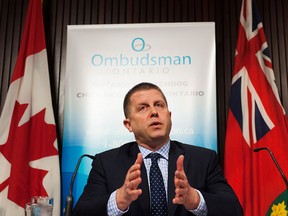 Ontario Ombudsman Andre Marin speaks at a news conference at Queens Park in Toronto on Tuesday February 4, 2014.