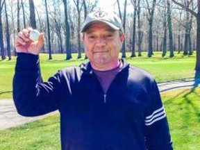 Tony Pelle used a three-hybrid to ace the 204-yard, 17th hole at Essex Golf & Country Club. (Courtesy of Bobby Devine)