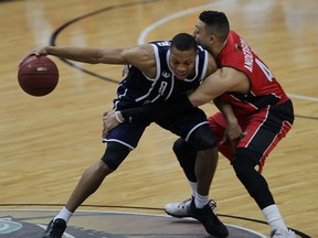 Windsor Express Ryan Anderson plays physical against Halifax Rainmen Joey Haywood, left, in NBL Canada championship at WFCU Centre Friday April 17, 2015. (NICK BRANCACCIO/The Windsor Star)