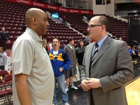 Express coach Bob Jones, left, talks with Windsor Mayor Drew Dilkens after Game 7 of the NBL of Canada final was postponed. (NICK BRANCACCIO/The Windsor Star)