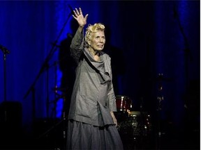 Singer Joni Mitchell has been hospitalized in Los Angeles. Mitchell's website and Twitter account reported Tuesday night that she was in the hospital, but gave no details on her condition. Mitchell is shown waving to the crowd during her 70th birthday tribute concert as part of the Luminato Festival at Massey Hall in Toronto on Tuesday, June 18, 2013. THE CANADIAN PRESS/Aaron Vincent Elkaim