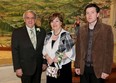 Dr. John Strasser joined by his wife Gayle Strasser and son, Kirby Strasser, right, at The Herb Gray Harmony Award celebration at Ciociaro Club of Windsor Thursday April 23, 2015. This year's harmony award winner is John Strasser, president of St. Clair College. Champion winner is Mario Collavino, founder Collavino Group. (NICK BRANCACCIO/The Windsor Star) (NICK BRANCACCIO/The Windsor Star)