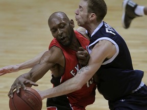 Windsor Express Quinnel Brown looses the handle against tough defence by Halifax Rainmen Forrest Fisher in NBL Canada Championship Game 6 at WFCU Centre, Tuesday April 28, 2015. (NICK BRANCACCIO/The Windsor Star)