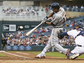 Detroit Tigers’ Anthony Gose hits an RBI single in the third inning of a baseball game off Minnesota Twins pitcher Mike Pelfrey, Tuesday, April 28, 2015, in Minneapolis. (AP Photo/Jim Mone)