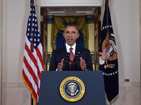 U.S. President Barack Obama delivers a prime time address from the Cross Hall of the White House on September 10, 2014 in Washington, DC.  Vowing to target the Islamic State with air strikes "wherever they exist", Obama pledged to lead a broad coalition to fight IS and work with "partner forces" on the ground in Syria and Iraq.  (Saul Loeb-Pool/Getty Images)