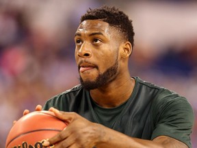 Branden Dawson of the Michigan State Spartans shoots during practice Friday at the NCAA Men's Final Four at Lucas Oil Stadium in Indianapolis. (Photo by Andy Lyons/Getty Images)