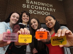Sandwich Secondary School students, from left, Sara Newman, Sarah Sinisac,  Maya Jach-Popovich, and Cattrina Crosby are running a business called Tag Me.  The business project under the direction of Sandwich teacher Rob Jasey, evolved into a business. (JASON KRYK/The Windsor Star)