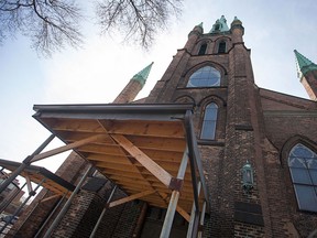 Scaffolding remains over the entrance to Assumption Church, Sunday, April 19, 2015.  (DAX MELMER/The Windsor Star)