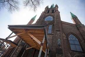 Scaffolding remains over the entrance to Assumption Church, Sunday, April 19, 2015.  (DAX MELMER/The Windsor Star)