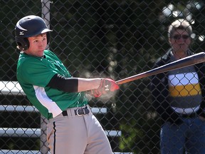 Herman's Damon Longmuir connects on a pitch during a game Tuesday, April 28, 2015, at the Riverside Baseball Park in Windsor, ON. against Tecumseh Vista. (DAN JANISSE/The Windsor Star) )