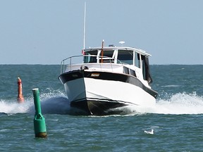 A motorboat on Lake Erie near the shores of Kingsville is shown in this 2014 file photo. (Jason Kryk / The Windsor Star)