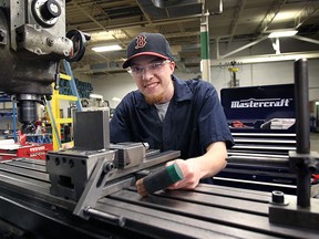 Brent Rankin, 20, is a general machinist in training, who is a graduating from a new CTMA program for skilled trades. He is being trained at J. F. K. Systems Inc. in Windsor, ON. where he is shown on Tuesday, April 28, 2015. (DAN JANISSE/The Windsor Star)