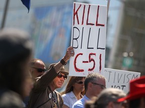 People protest Bill C-51 legislation at the corner of Riverside Dr. West and Church St., Saturday, April 18, 2015.  (DAX MELMER/The Windsor Star)