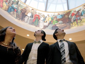 WINDSOR, ONT.: (4/18/15) -- Young Italians from left to right, Dina Butera, Peter Distefano and Franco Pacecca check out the cupola painting at the Giovanni Caboto Club during its 90th anniversary dinner Saturday, April 18, 2015. Over 1,000 guests attended. (RICK DAWES/The Windsor Star)