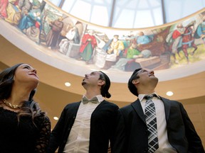 Young Italians from left to right, Dina Butera, Peter Distefano and Franco Pacecca check out the cupola painting at the Giovanni Caboto Club during its 90th anniversary dinner Saturday, April 18, 2015. Over 1,000 guests attended. (RICK DAWES/The Windsor Star)