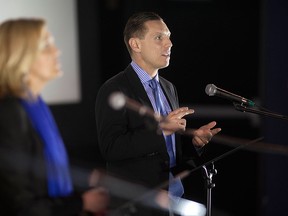 Ontario PC leadership candidates, Christine Elliott, left, and Patrick Brown, square off in the first Ontario PC leadership debate at Lakeshore Cinemas, Saturday, April 11, 2015.   (DAX MELMER/The Windsor Star)