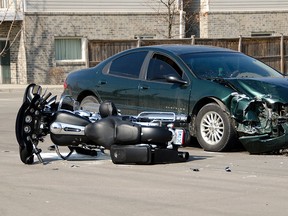 A car and motorcycle collided at the intersection of McHugh and Lauzon Line in East Windsor, Wednesday afternoon. (GABRIELLE SMITH/Special to the Windsor Star)