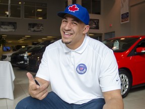 Tyrone Crawford, defensive end for the Dallas Cowboys, is pictured at Performance Ford during a meet-and-greet event promoting Windsor’s Finest Football Academy. (GABRIELLE SMITH/Special to The Windsor Star)