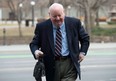 Suspended Senator Mike Duffy arrives at the courthouse for his trial in Ottawa, Friday, April 17, 2015. (THE CANADIAN PRESS/Adrian Wyld)