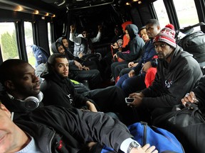 Windsor Express players board the team bus after arriving at the airport in Windsor Monday. (TYLER BROWNBRIDGE/The Windsor Star)
