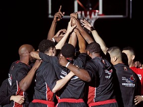 The Windsor Express team huddles before the start of game 7 of the central conference finals between the Windsor Express and the visiting Brampton A's at the WFCU Centre, Sunday, April 12, 2015.  (DAX MELMER/The Windsor Star)