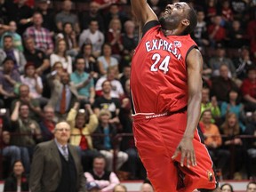Windsor's Chris Commons dunks the ball on a breakaway in the first quarter of the central conference finals between the Windsor Express and the visiting Brampton A's at the WFCU Centre, Sunday, April 12, 2015.  (DAX MELMER/The Windsor Star)
