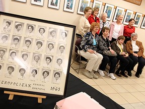 A group of former graduates has a picture taken during a ceremony to introduce the newly created digital archive of the Metropolitan General Hospital School of Nursing archives at Windsor Regional Hospital in Windsor on Tuesday, April 21, 2015. Most of the material in the archive was donated by Kathleen Moderwell who served as the director of the school from 1958 to 1974.               (TYLER BROWNBRIDGE/The Windsor Star)