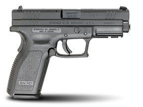 A promotional image of a 9-mm Springfield Armory XD semi-automatic pistol.
