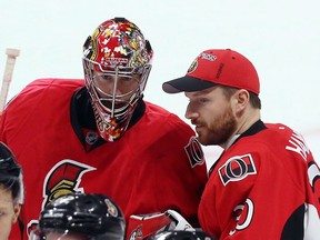 Ottawa Senators goaltender Craig Anderson (left) is congratulated by backup goaltender Andrew Hammond following the shootout period of NHL hockey against against the Calgary Flames in Ottawa on Sunday, March 8, 2015. The Hamburgler will take a seat and Anderson will start for the Ottawa Senators in Game 3 of their NHL Eastern Conference playoff series against Montreal. THE CANADIAN PRESS/Fred Chartrand