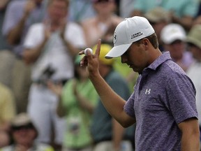 Jordan Spieth acknowledges applause after a birdie on the 10th hole during the second round of the Masters golf tournament Friday, April 10, 2015, in Augusta, Ga. (AP Photo/Chris Carlson)