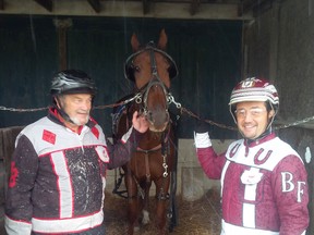 Lakeshore Mayor and Essex County Warden, Tom Bain, left, stands with Kingsville Mayor Nelson Santos at the horse track. (Courtesy of The Bain family)