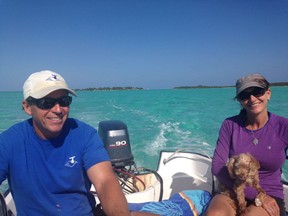 Shannon and Mark Matheson, shown with their dog Charlie, manage a privately owned island luxury retreat in the Bahamas. (Courtesy of Michaela Matheson)